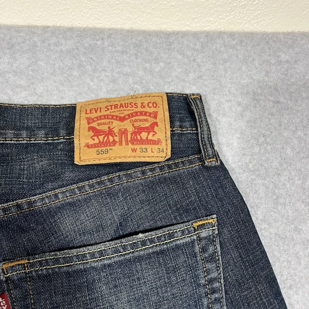 Levis Jeans Mens 33x34 (Fits 34x34) Blue 559 Relaxed Straight Dark Denim Cotton